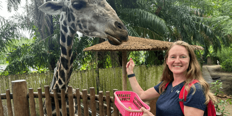 Lucy and a giraffe